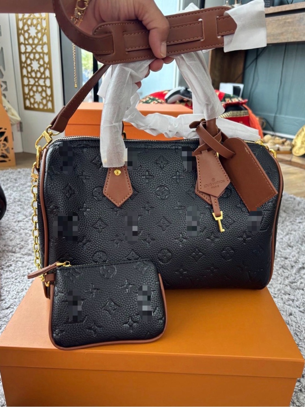Black Embossed Satchel with Brown Trim and Wrist Pouch